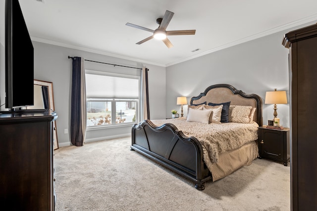 carpeted bedroom with crown molding and ceiling fan