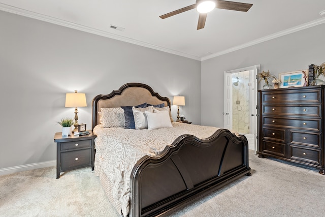 carpeted bedroom featuring connected bathroom, ornamental molding, and ceiling fan