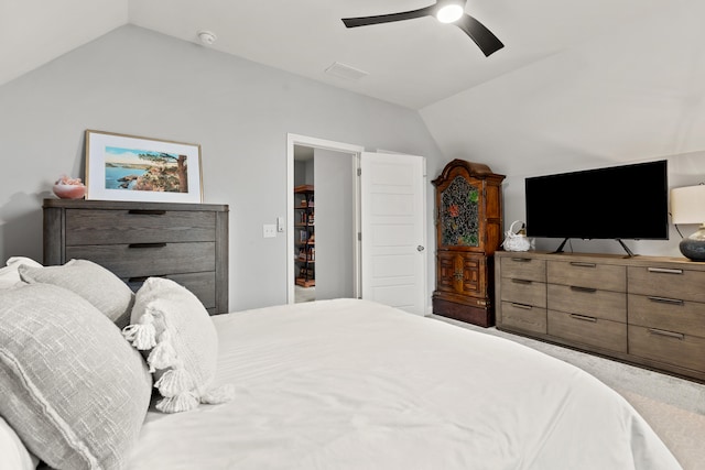 bedroom with lofted ceiling and ceiling fan