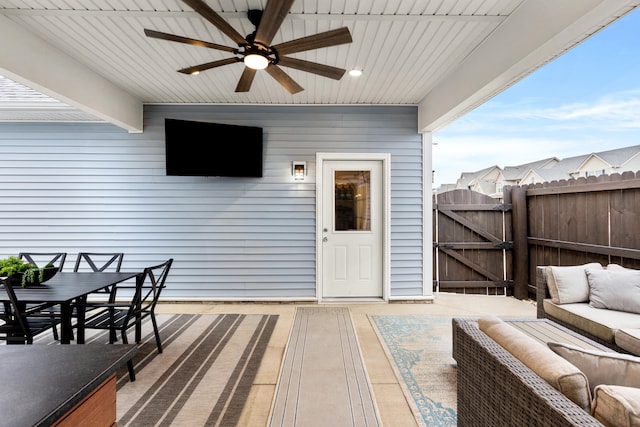 exterior space featuring an outdoor living space, a patio, and ceiling fan