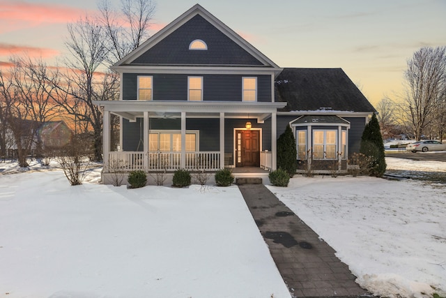 view of front of property featuring covered porch