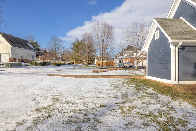 view of yard covered in snow