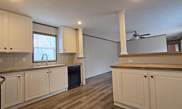 kitchen featuring white cabinetry, sink, black dishwasher, ceiling fan, and dark wood-type flooring