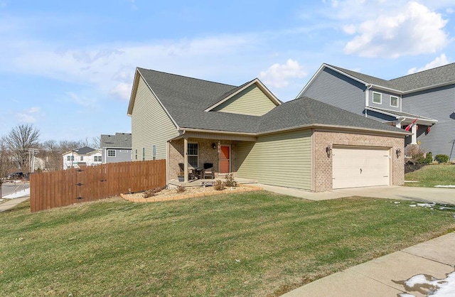 view of front facade featuring a garage and a front yard