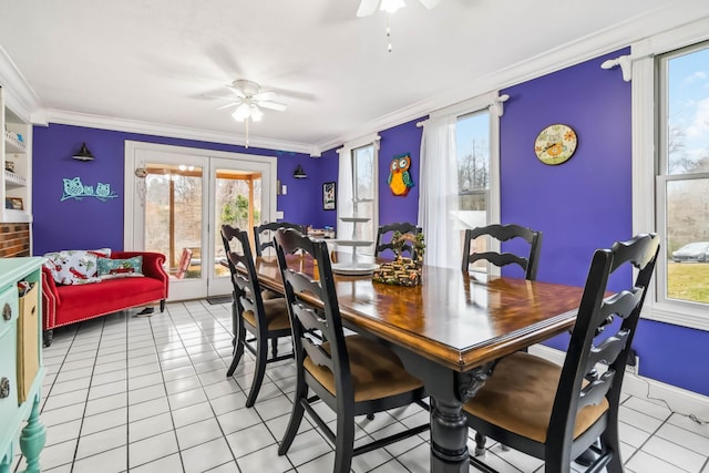 dining area with ceiling fan, ornamental molding, and a healthy amount of sunlight