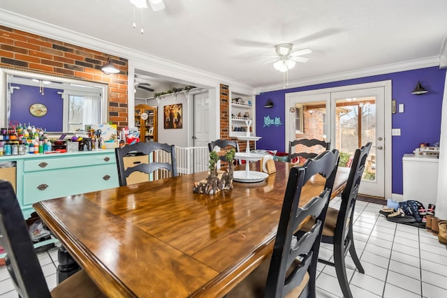 dining area with a wealth of natural light, ornamental molding, and ceiling fan