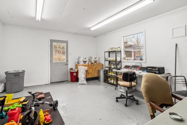 home office with concrete flooring