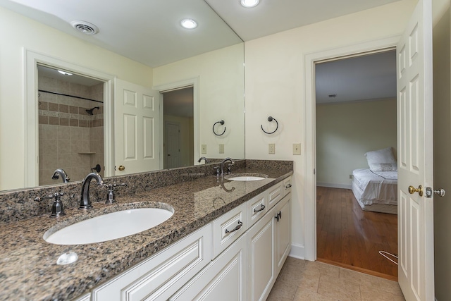 bathroom with vanity and tile patterned flooring