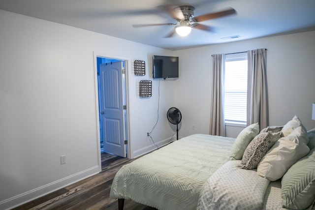 bedroom featuring dark hardwood / wood-style floors and ceiling fan