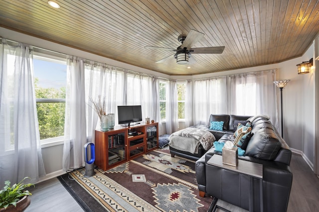 sunroom / solarium with wooden ceiling and ceiling fan