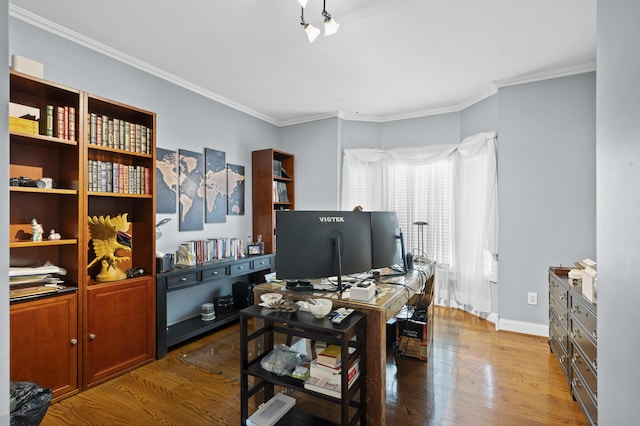 home office with crown molding and hardwood / wood-style floors