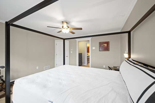 bedroom with crown molding and ceiling fan