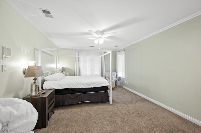 bedroom with light colored carpet, ornamental molding, and ceiling fan