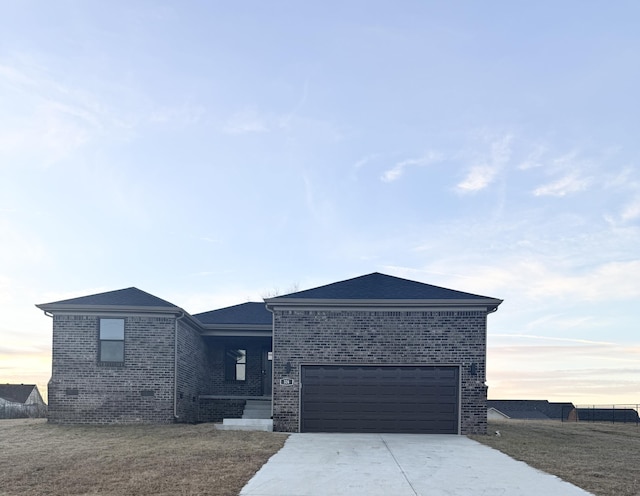 view of front of home featuring a garage