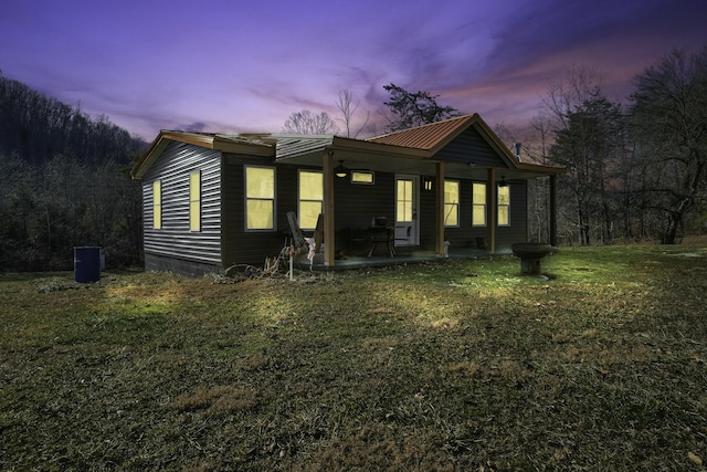 view of front of property with a lawn