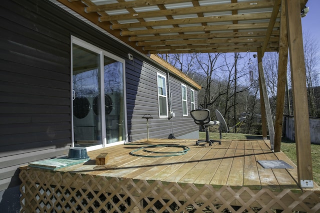 view of patio / terrace with a deck and a pergola