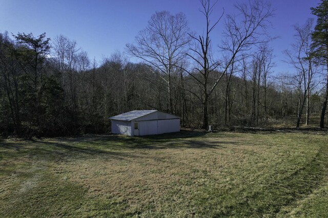 view of side of home featuring a lawn