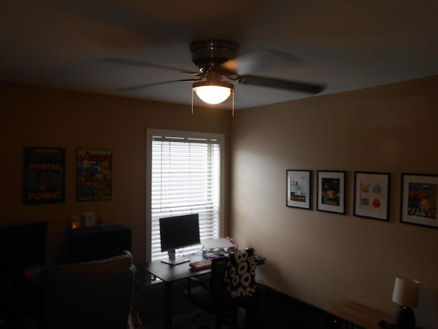 office space with ceiling fan