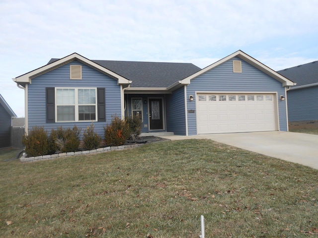 ranch-style house with a garage and a front lawn