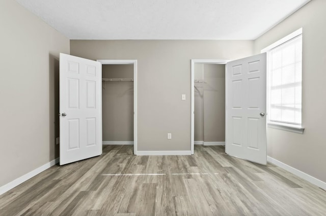 unfurnished bedroom featuring light hardwood / wood-style floors