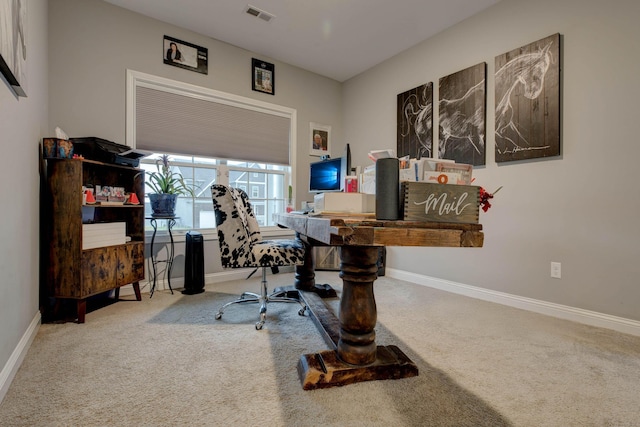 office area featuring carpet, visible vents, and baseboards