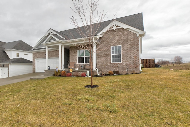 view of front of house featuring a porch, brick siding, driveway, and a front lawn