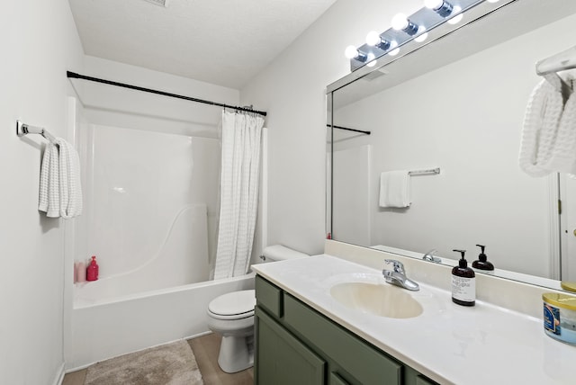 full bathroom featuring shower / tub combo, vanity, and toilet