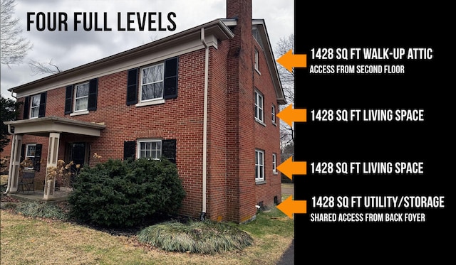 view of property exterior with brick siding and a chimney