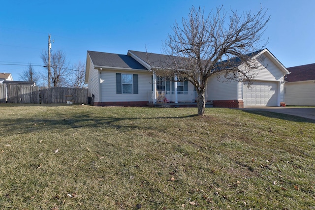 ranch-style house featuring a garage, a front yard, and covered porch