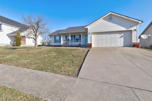 ranch-style house featuring a garage, a front yard, and a porch