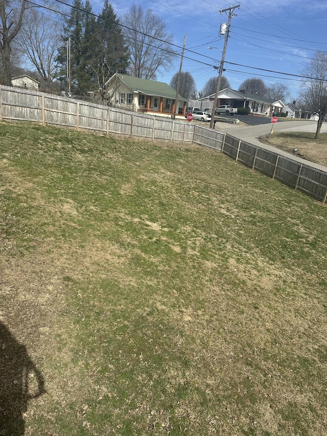 view of yard featuring fence