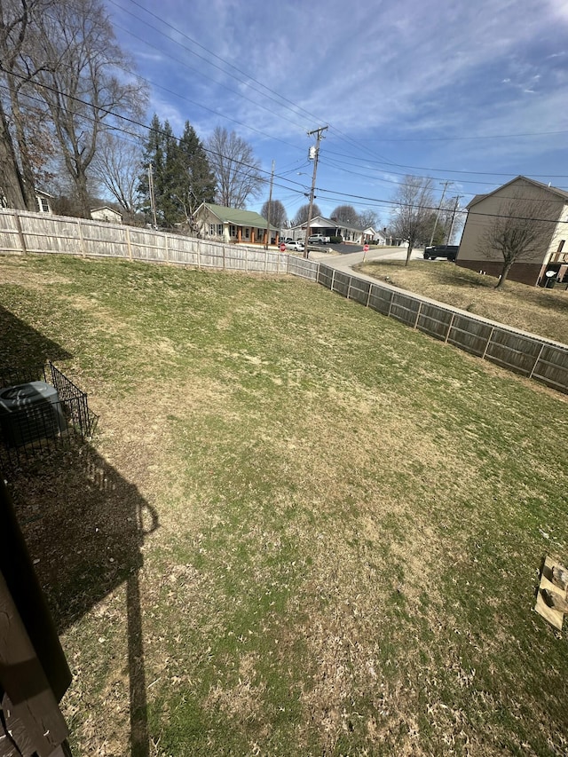 view of yard with fence