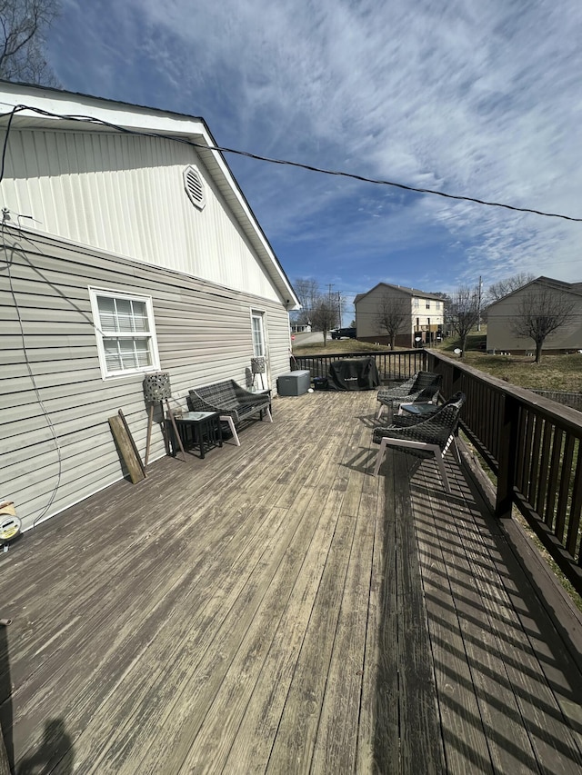 wooden terrace with central air condition unit