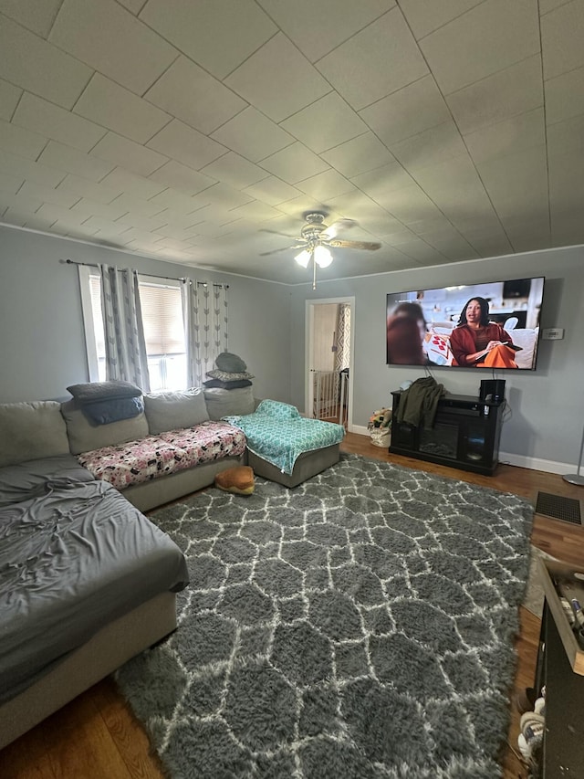 bedroom with hardwood / wood-style floors and ceiling fan