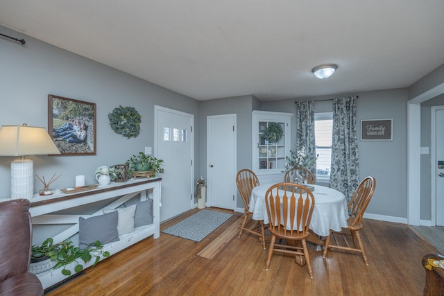 dining room featuring hardwood / wood-style flooring