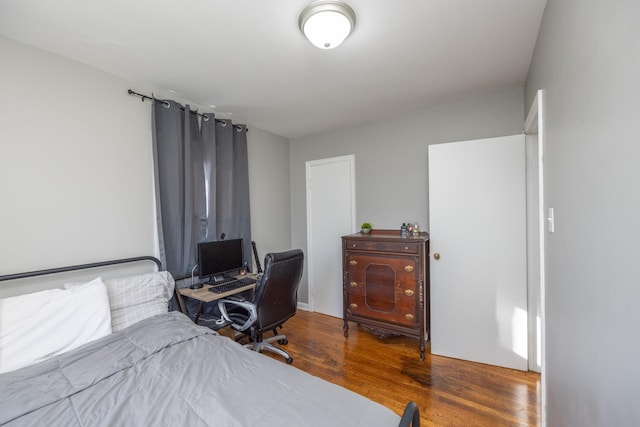 bedroom featuring hardwood / wood-style floors