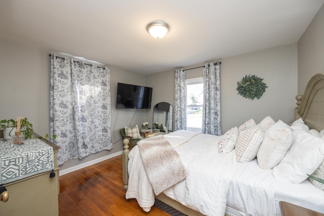 bedroom featuring dark wood-type flooring