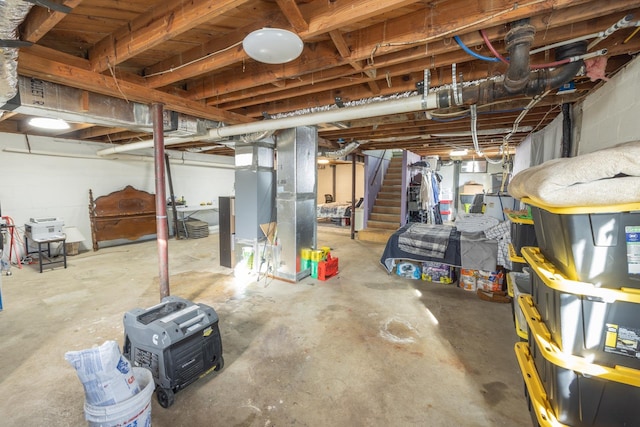 basement featuring heating unit