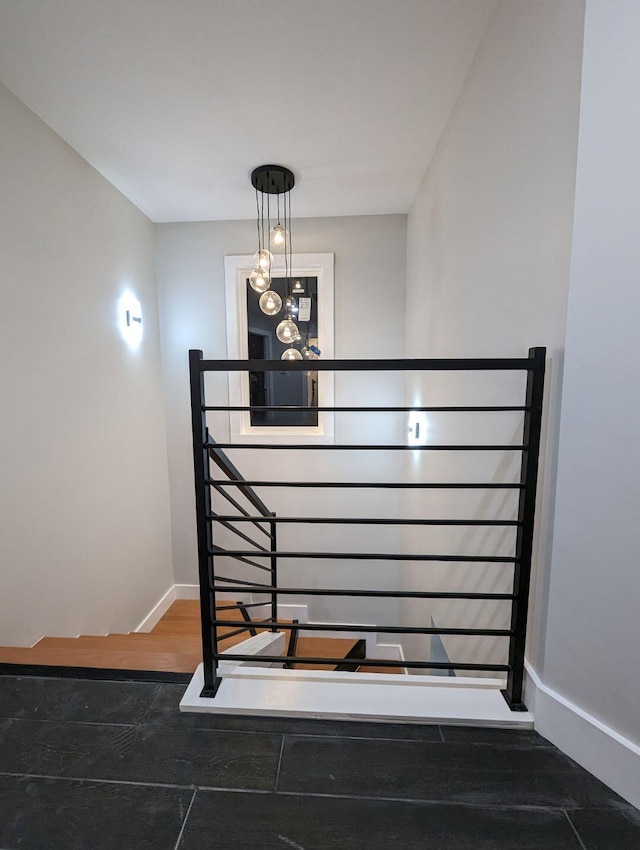 stairs with hardwood / wood-style flooring