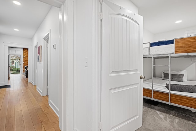 corridor featuring hardwood / wood-style floors