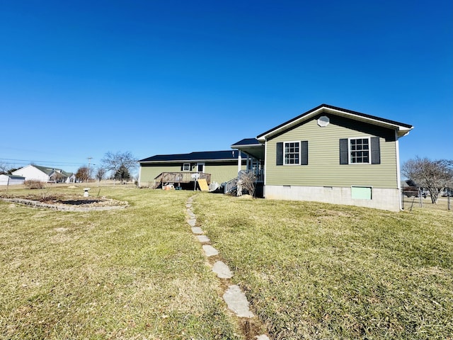 view of property exterior with a yard