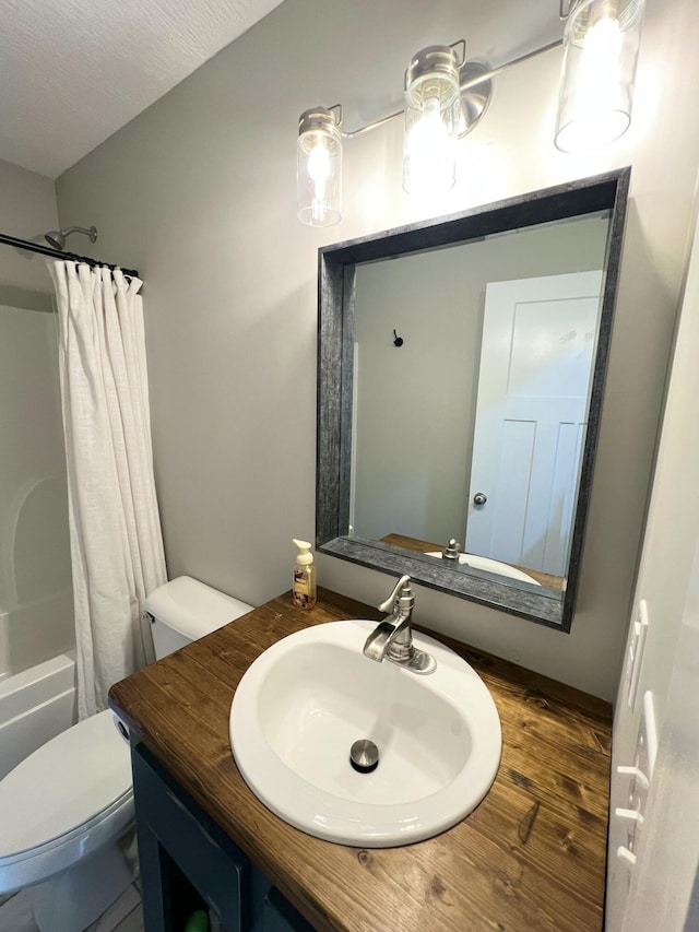 full bathroom featuring shower / bathtub combination with curtain, vanity, hardwood / wood-style floors, and toilet