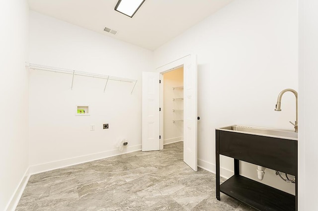 laundry area featuring hookup for a washing machine and hookup for an electric dryer