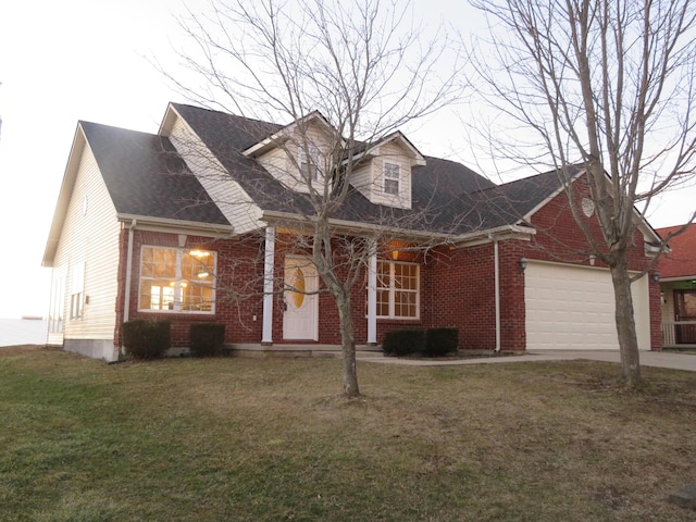 new england style home with a garage and a front lawn