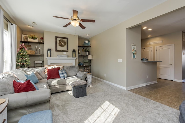 tiled living room featuring recessed lighting, carpet flooring, a fireplace, and baseboards