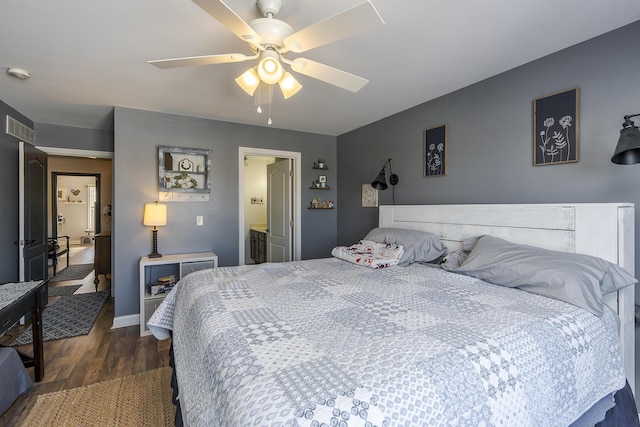 bedroom featuring dark wood-type flooring and ceiling fan