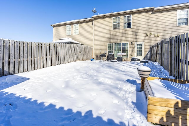 view of snow covered house