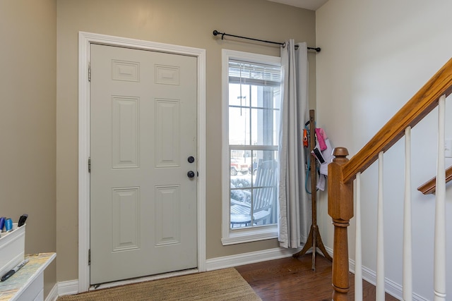 foyer entrance featuring dark hardwood / wood-style flooring