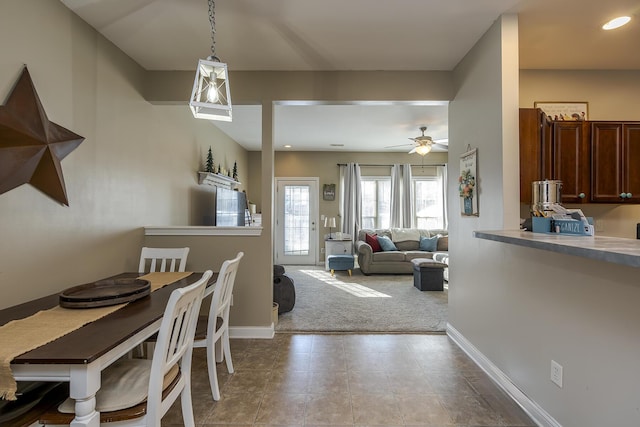 dining space with carpet, baseboards, a ceiling fan, and recessed lighting