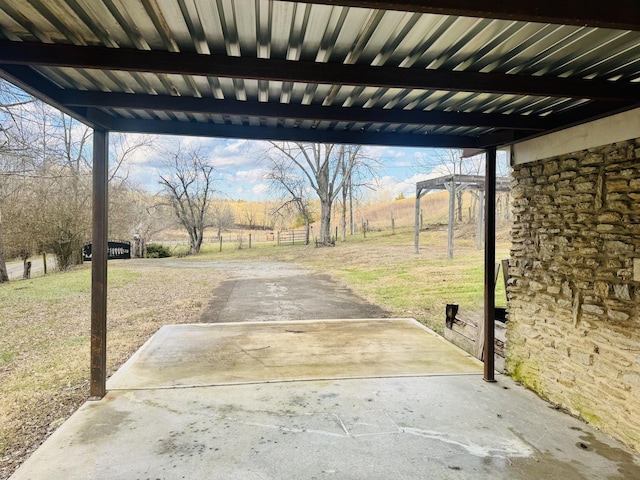 view of yard with a patio and a rural view